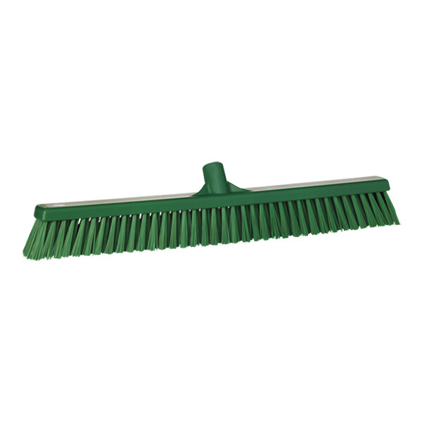 A green Vikan push broom head with bristles.