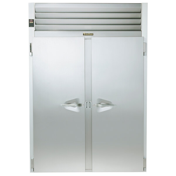 A Traulsen specification line roll-thru heated holding cabinet with two stainless steel doors open.