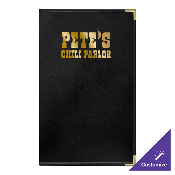 A black H. Risch, Inc. Tuxedo leather menu cover on a counter.