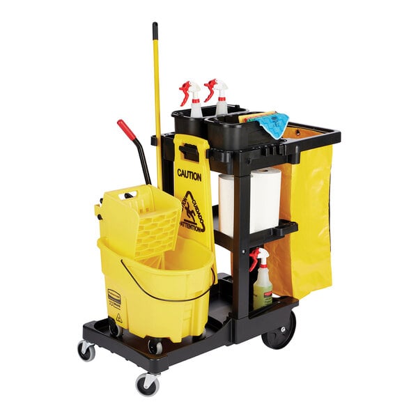 A janitor cart with shelves, a yellow vinyl zippered bag, and cleaning supplies including a mop bucket and caution sign.