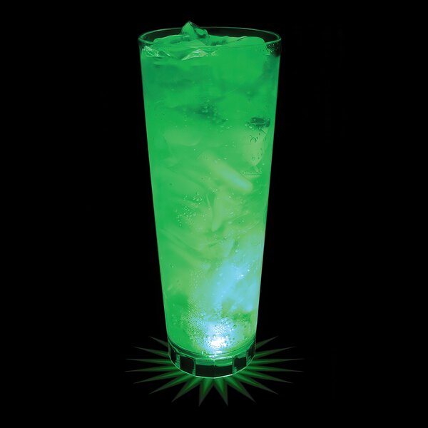 A customizable plastic cup with a green LED light filled with a green drink and ice.
