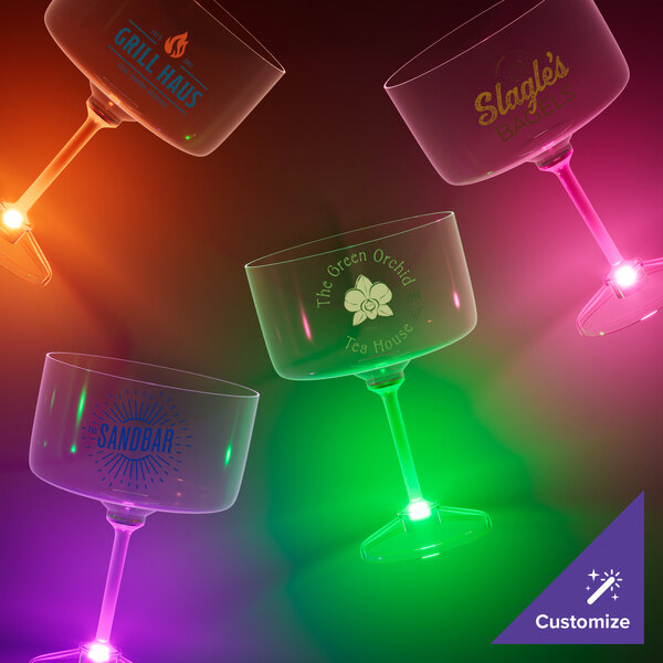 A close up of a customizable plastic margarita glass with a green LED light.