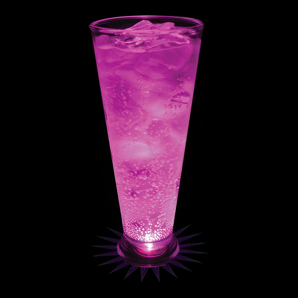 A customizable plastic pilsner cup with a purple LED light filled with a pink drink and ice cubes.