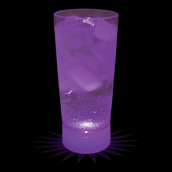 A close-up of a 10 oz. purple plastic cup with a drink and ice in it.