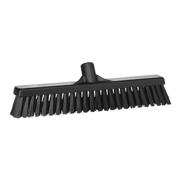 A black Vikan push broom head with flagged / unflagged bristles.