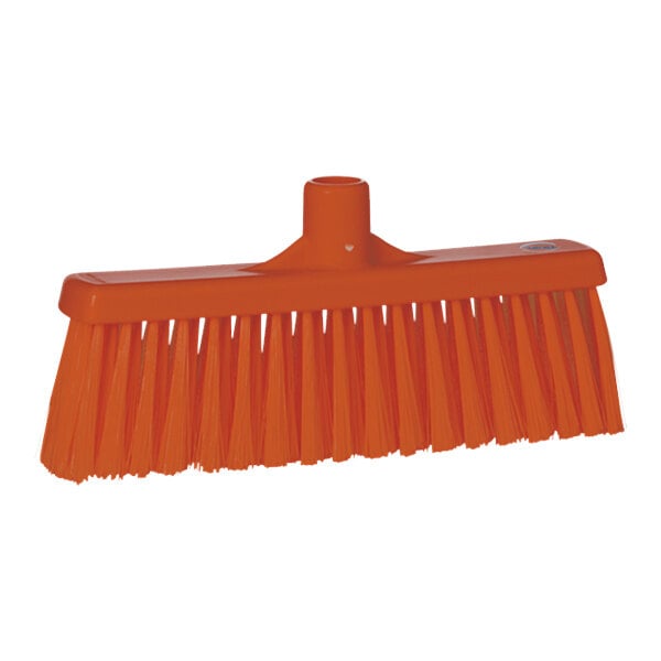 An orange Vikan straight lobby broom head.