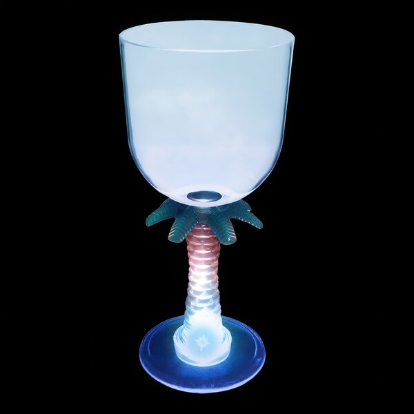 A clear plastic goblet with a palm tree stem and blue LED light.
