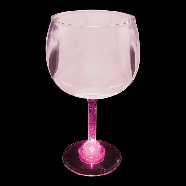 A customizable plastic goblet with pink LED lights.