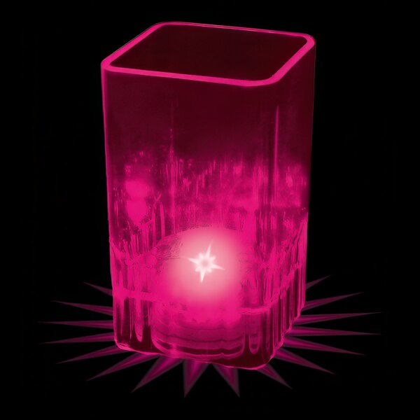 A pink plastic square shot cup with a pink LED light inside.