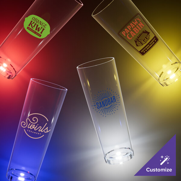 A close-up of a 24 oz. plastic tumbler with a yellow LED light.