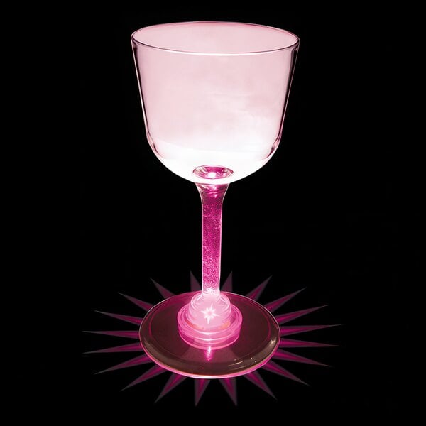 A close-up of a customizable plastic wine cup with a pink LED light.