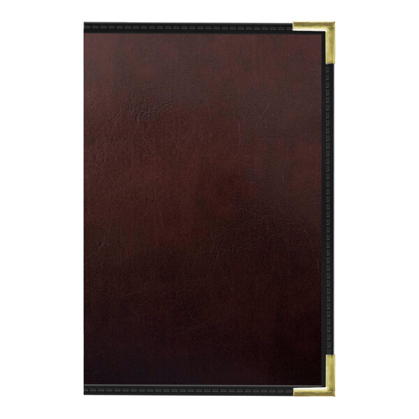 A close-up of a brown leather H. Risch, Inc. Wine Tuxedo menu cover with gold trim.