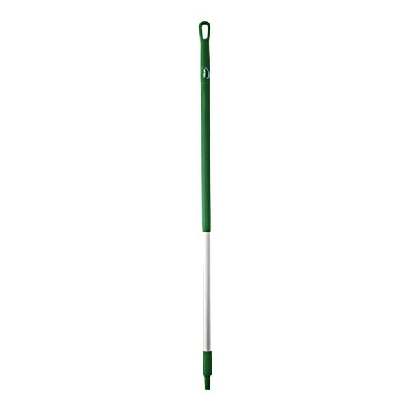 A green pole with a white background.