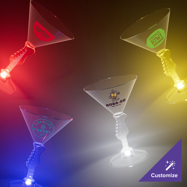 A group of 7 oz. plastic martini glasses with guitar stems and blue LED lights.