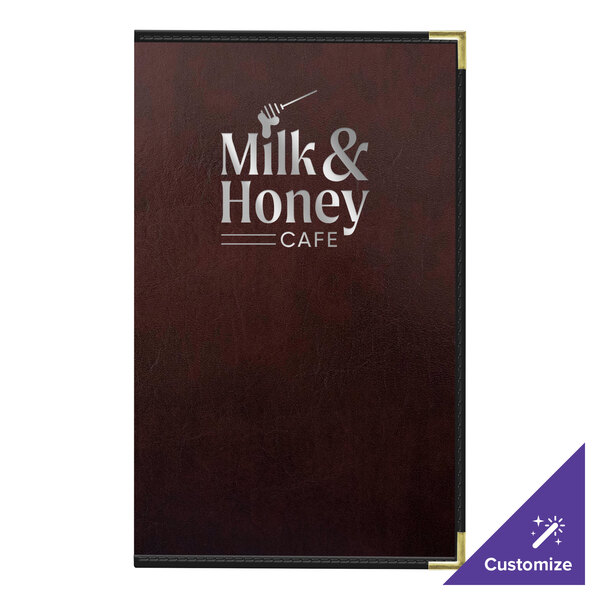 A brown leather H. Risch, Inc. menu cover with the words "Milk and Honey Cafe" on it.