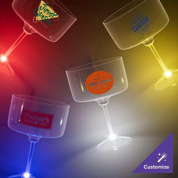 A close-up of a customizable plastic margarita glass with a blue LED light.