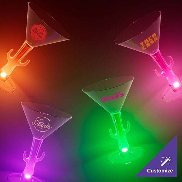 Three different colored cactus stem martini glasses with green LED lights.