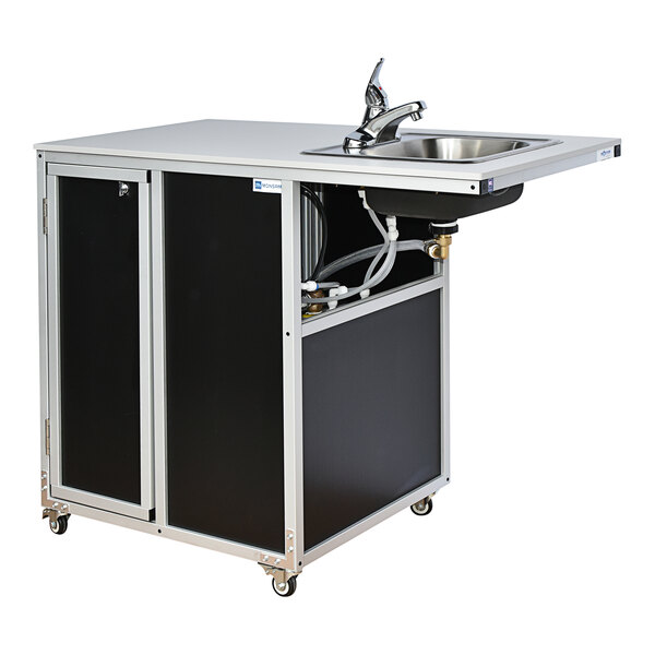 A black Monsam wheelchair accessible portable sink on wheels.