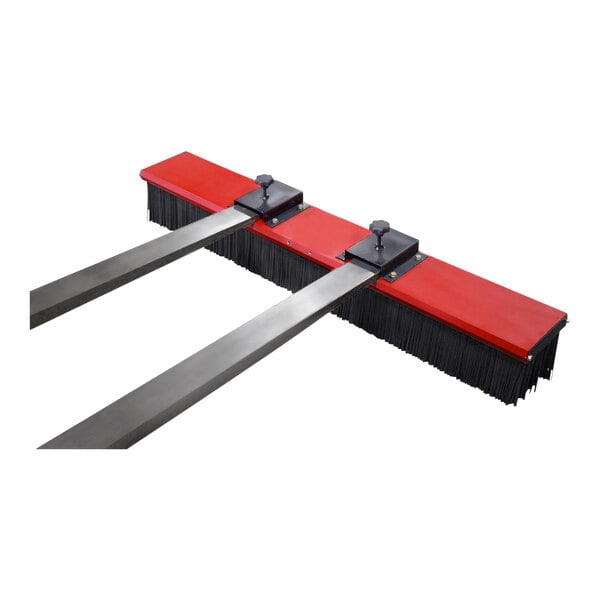 A red and black brush with black handles.