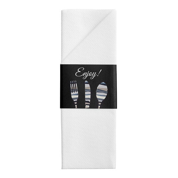 A napkin with a fork and spoons on it.