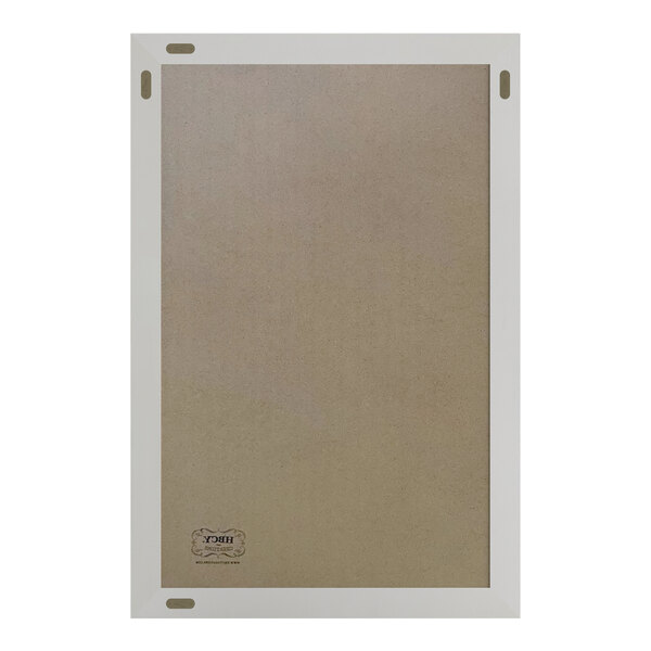 A white wall mount chalkboard with a white frame.