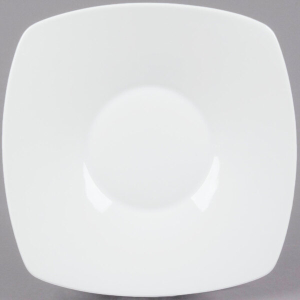 A white square porcelain plate with a rounded edge.