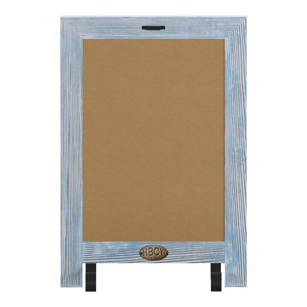 A brown board with a blue wood frame and white background with blue writing.