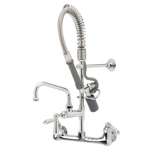 A T&S chrome wall-mounted pre-rinse faucet with club handles and a hose.