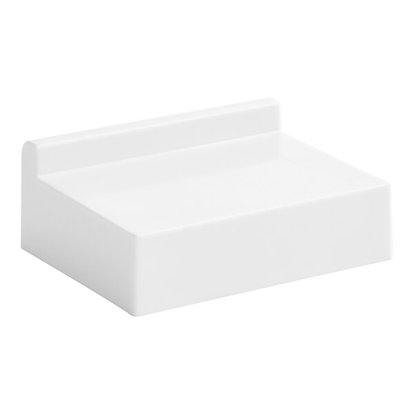 A rectangular white Avantco spacer on a white background.