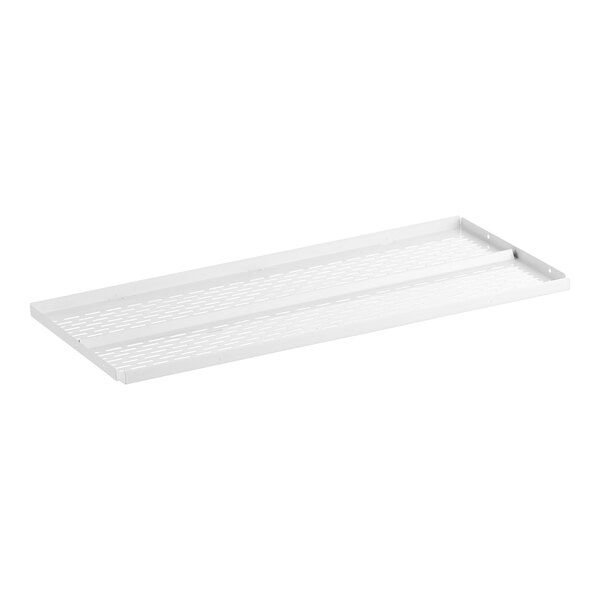 A white metal shelf with holes for an Avantco Merchandiser Refrigerator.
