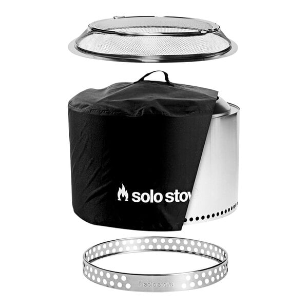 A large metal Solo Stove fire pit with a black stand and cover.