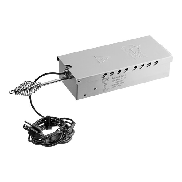 A close-up of a silver Cooking Performance Group smoker box with a wire.