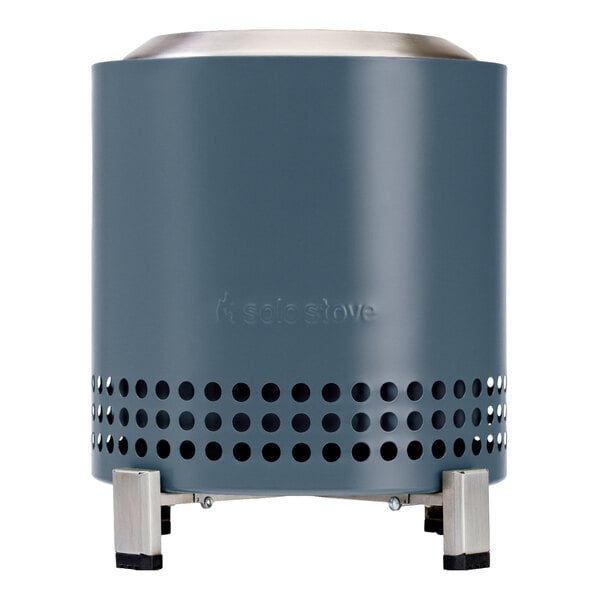 A blue stainless steel Solo Stove Mesa XL on a metal stand with a white background.