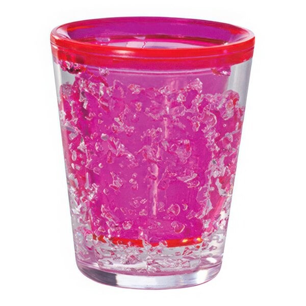 A Franmara Arctic gel shot glass with pink liquid in it.