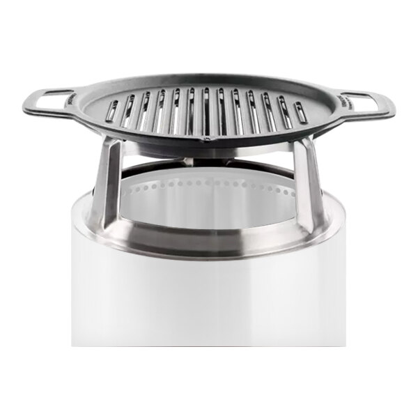 A Solo Stove Bonfire grill top on a white surface.