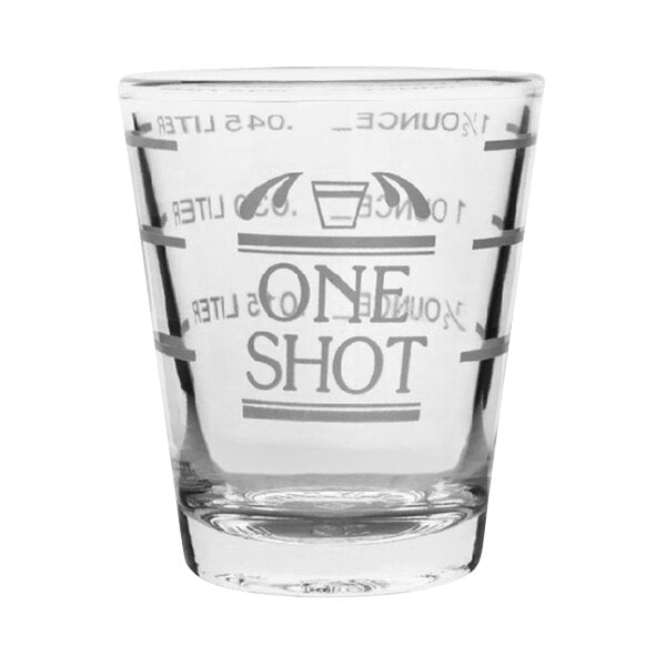 A clear Franmara shot glass with pour lines.