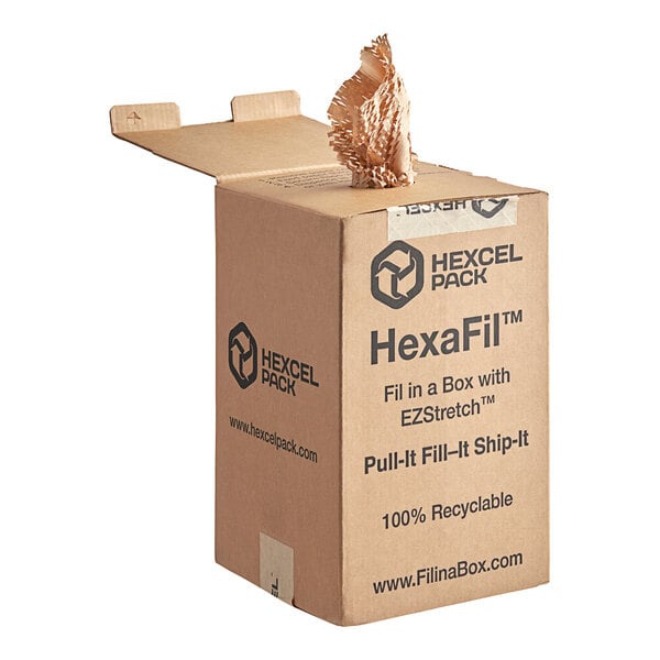 A brown HexaFil dispenser box with black text on it filled with small pieces of white HexaFil paper.