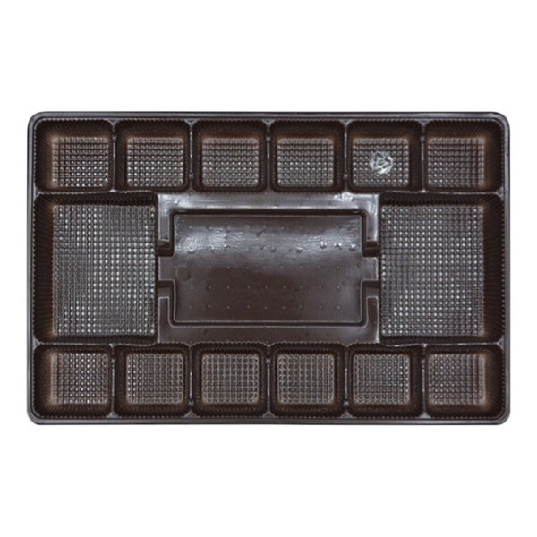 A rectangular brown metal candy tray with 15 compartments.