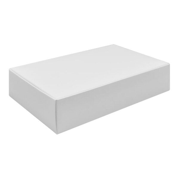 A 7 11/16" x 5" x 1 3/4" white candy box.