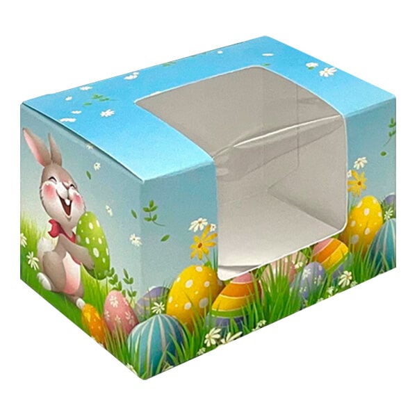 A blue Easter Bunny candy box with a window and rabbit and egg designs.