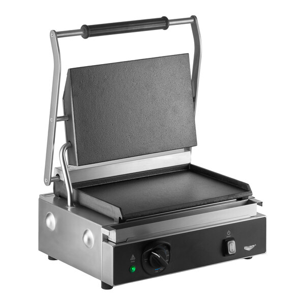 A commercial panini grill with smooth cast iron plates and a stainless steel exterior.
