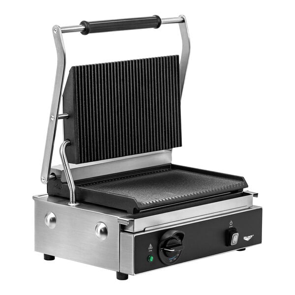 A Vollrath stainless steel panini grill with black and silver accents on a counter.