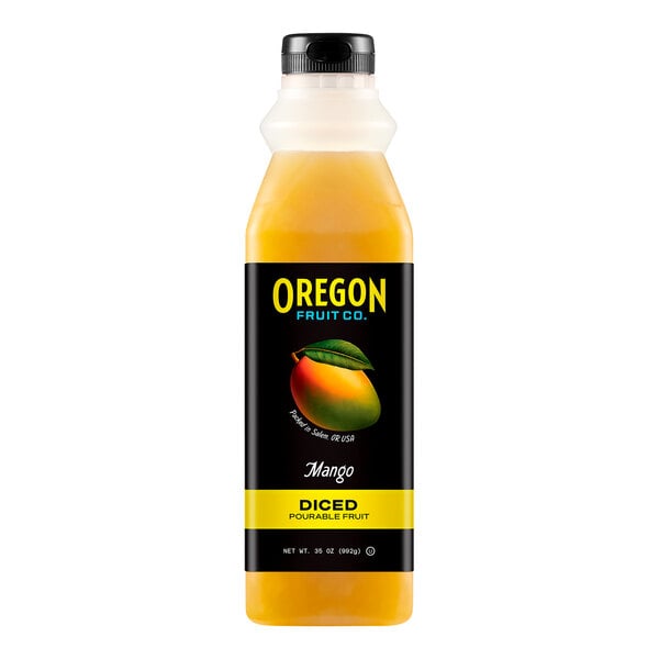 A case of Oregon Mango diced pourable fruit on a table.
