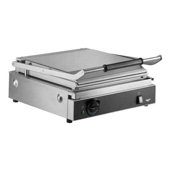 A large stainless steel panini grill with smooth aluminum plates and a handle, designed for commercial use.