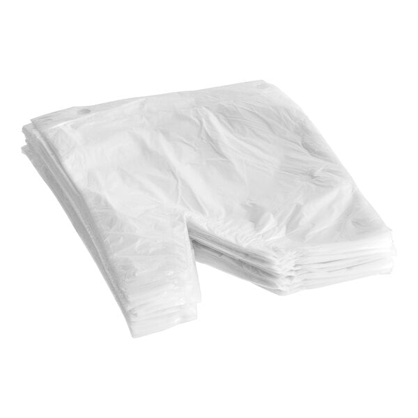 A stack of clear plastic Pak-Sher mitts.