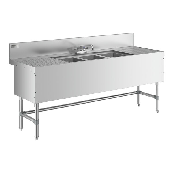 A Regency stainless steel underbar sink with three bowls, two 18" drainboards, and a faucet.