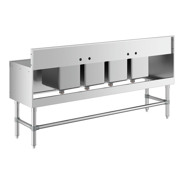 A Regency stainless steel underbar sink with four bowls and 2 faucets.