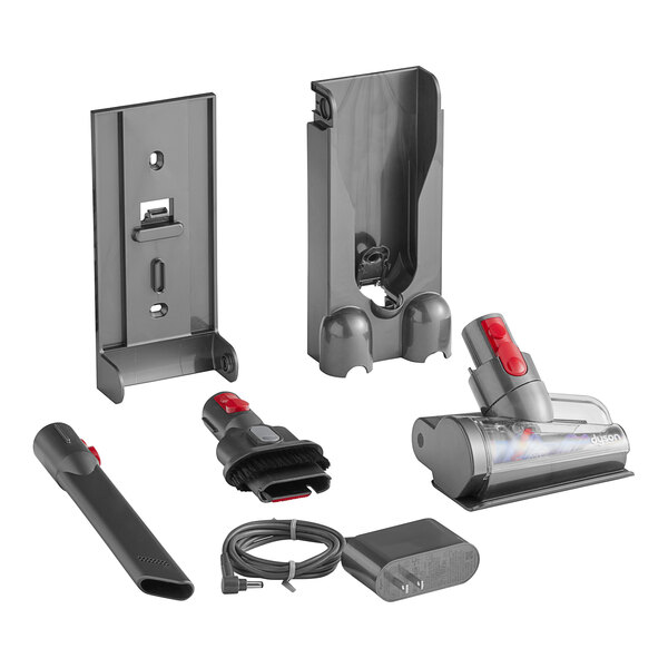 A Dyson V11 cordless stick vacuum with various accessories and tools.