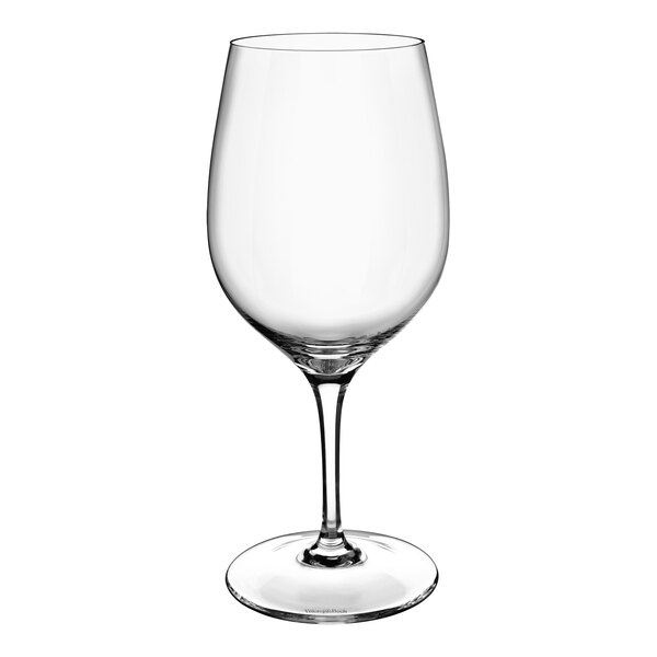 A close-up of a clear Villeroy & Boch red wine glass with a stem.