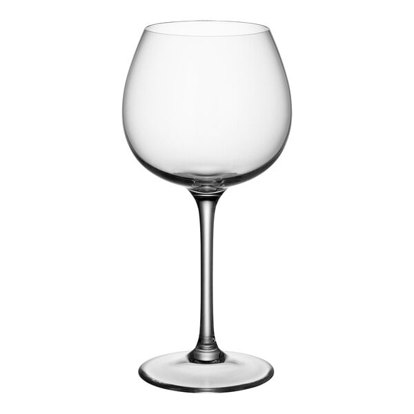 A close-up of a clear Villeroy & Boch Purismo red wine glass with a long stem.